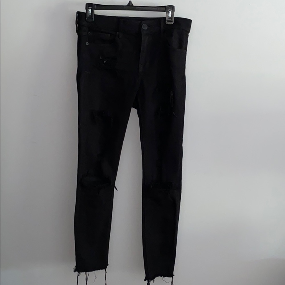 Ripped black skinny jeans